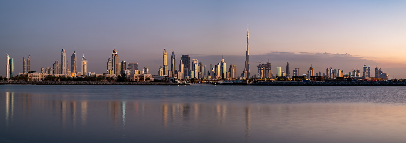 Panoramic View Of Dubai Skyline At Sunset Uae